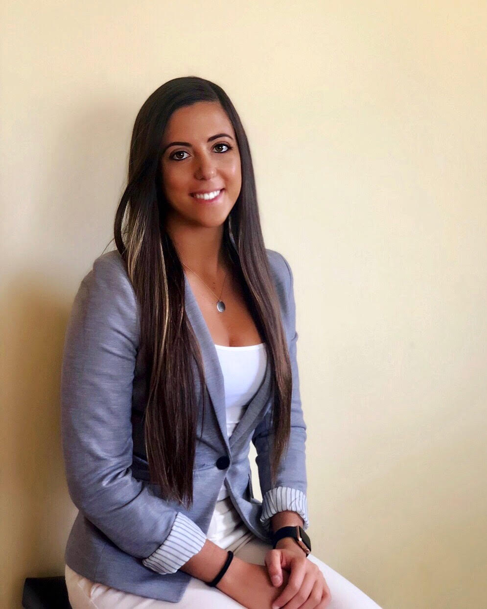 A young woman with dark hair.